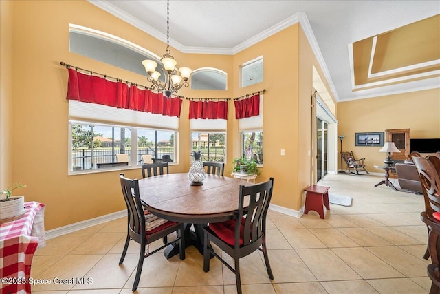 dining area featuring crown molding, light tile patterned floors, an inviting chandelier, and baseboards