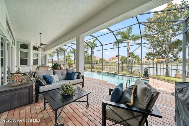 wooden deck featuring a fenced in pool, outdoor lounge area, and a patio