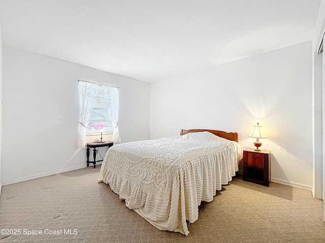 537 Ebony St, Melbourne, FL 32935 - carpeted bedroom featuring baseboards