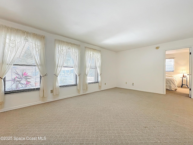 537 Ebony St, Melbourne, FL 32935 - carpeted spare room featuring baseboards