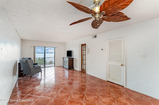 1025 Rockledge Dr Unit 502A, Rockledge, FL 32955 - unfurnished room featuring tile patterned floors and a ceiling fan