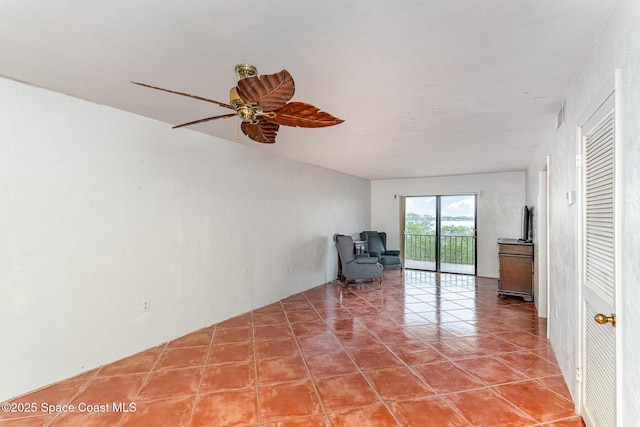 1025 Rockledge Dr Unit 502A, Rockledge, FL 32955 - unfurnished room featuring ceiling fan and tile patterned flooring