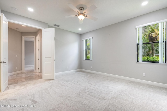 unfurnished room with recessed lighting, visible vents, ceiling fan, and light colored carpet