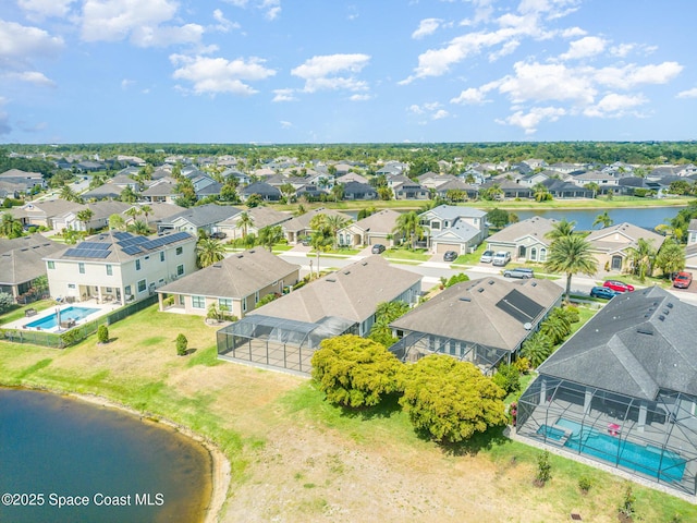 aerial view with a water view and a residential view
