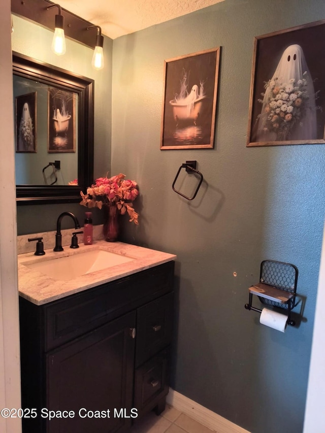 122 Morgan Cir, Sebastian, FL 32958 - bathroom with baseboards, tile patterned flooring, and vanity