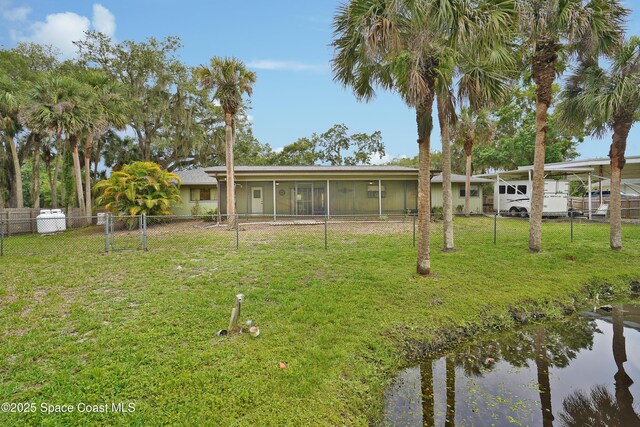 670 Kings Way, Merritt Island, FL 32953 - view of yard with a sunroom