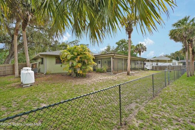 670 Kings Way, Merritt Island, FL 32953 - view of yard with a sunroom
