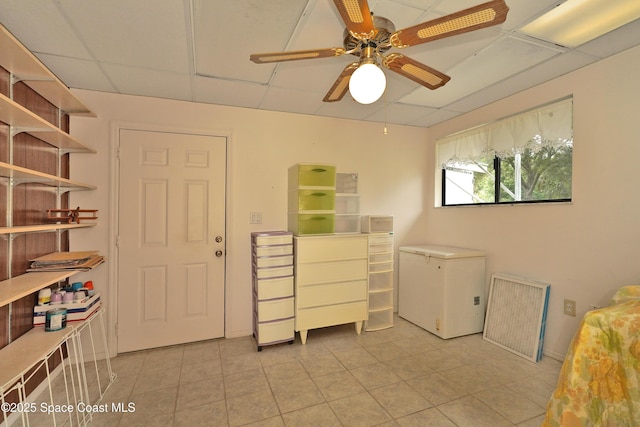 670 Kings Way, Merritt Island, FL 32953 - laundry area featuring light tile patterned floors and ceiling fan