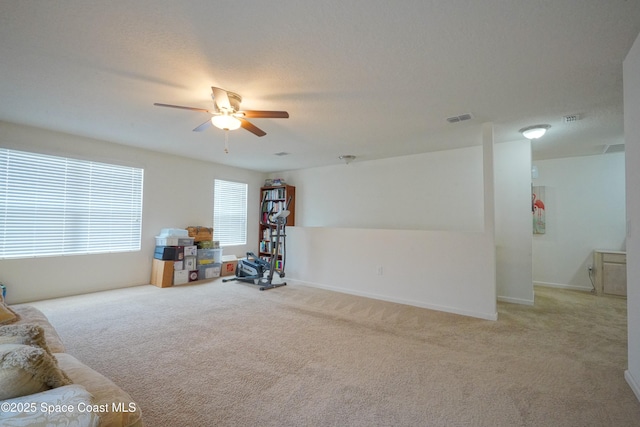 436 Great Falls Ln SW, Palm Bay, FL 32908 - interior space with visible vents, ceiling fan, and light carpet