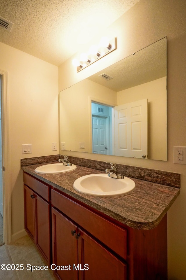 436 Great Falls Ln SW, Palm Bay, FL 32908 - bathroom featuring a sink, double vanity, and visible vents