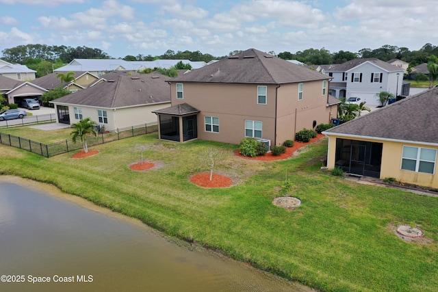 436 Great Falls Ln SW, Palm Bay, FL 32908 - exterior space with a residential view, stucco siding, a sunroom, a fenced backyard, and a lawn