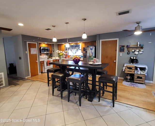 4805 Worth Ave, Titusville, FL 32780 - interior space with a ceiling fan, visible vents, light tile patterned flooring, and recessed lighting