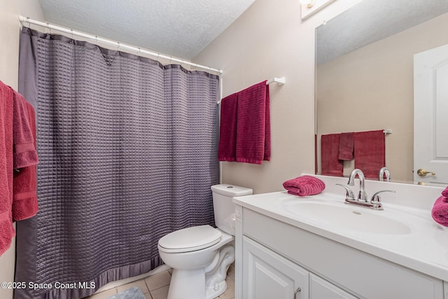 bathroom featuring a shower with curtain, a textured ceiling, tile patterned flooring, vanity, and toilet