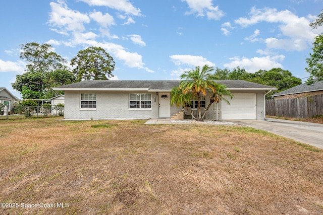 ranch-style home with fence, a front lawn, brick siding, a garage, and concrete driveway