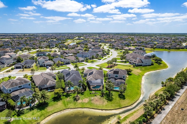 aerial view with a water view and a residential view