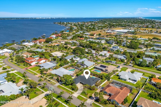 320 Amberjack Pl, Melbourne Beach, FL 32951 - drone / aerial view featuring a water view and a residential view