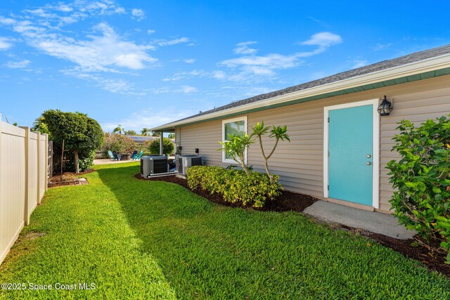 320 Amberjack Pl, Melbourne Beach, FL 32951 - view of yard with fence and cooling unit