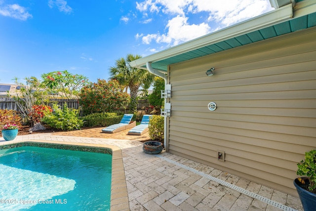 320 Amberjack Pl, Melbourne Beach, FL 32951 - view of pool featuring a fenced in pool, a fenced backyard, and a patio area