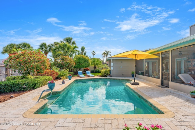 320 Amberjack Pl, Melbourne Beach, FL 32951 - outdoor pool with a patio and a sunroom