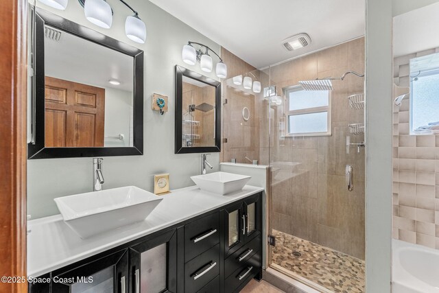 320 Amberjack Pl, Melbourne Beach, FL 32951 - full bathroom with a shower stall, plenty of natural light, and a sink