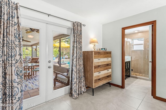 320 Amberjack Pl, Melbourne Beach, FL 32951 - entryway with french doors, ceiling fan, and light tile patterned flooring