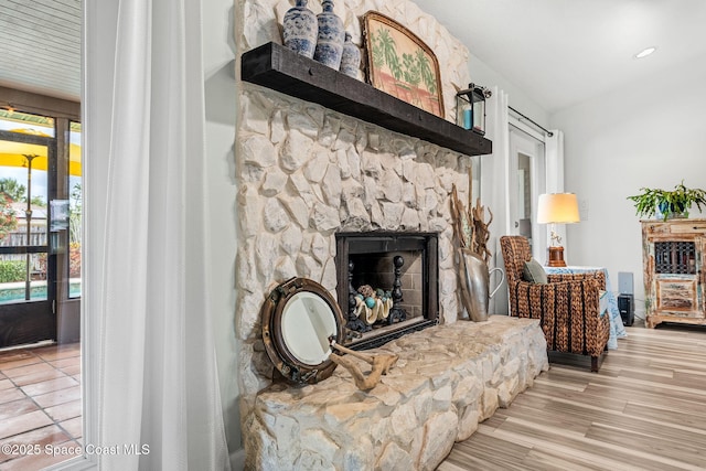 320 Amberjack Pl, Melbourne Beach, FL 32951 - living area featuring a stone fireplace and wood finished floors