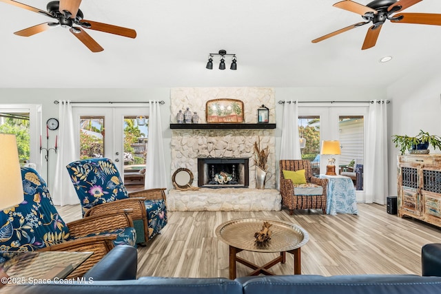 320 Amberjack Pl, Melbourne Beach, FL 32951 - living room featuring ceiling fan, a wealth of natural light, and french doors