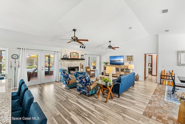 320 Amberjack Pl, Melbourne Beach, FL 32951 - living area featuring french doors, plenty of natural light, visible vents, and light wood-type flooring