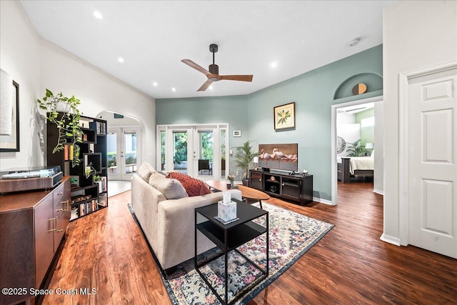 living area with recessed lighting, ceiling fan, baseboards, french doors, and wood finished floors