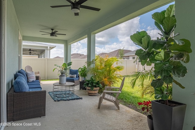 view of patio / terrace featuring a ceiling fan and a fenced backyard