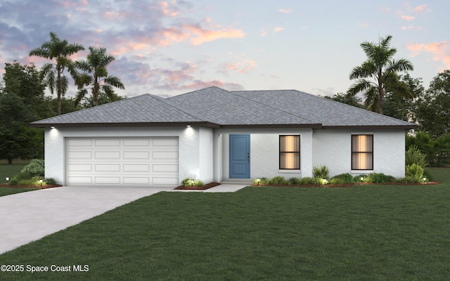 view of front of property featuring concrete driveway, a yard, a garage, and stucco siding