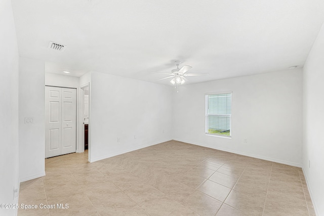 1591 Palatka Rd SE, Palm Bay, FL 32909 - unfurnished room featuring visible vents, baseboards, recessed lighting, a ceiling fan, and light tile patterned floors
