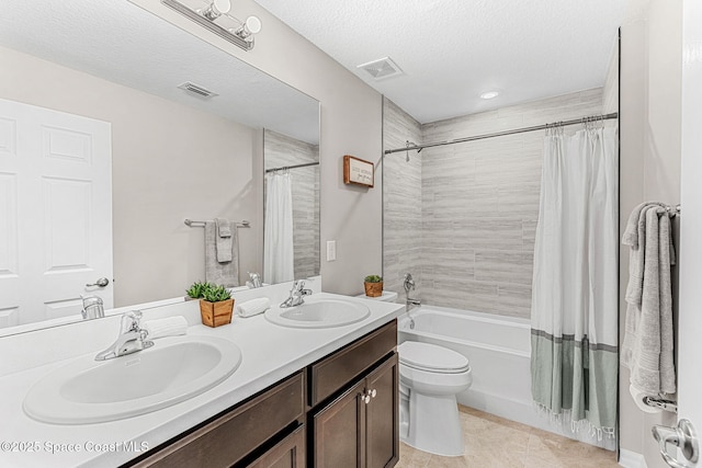 1591 Palatka Rd SE, Palm Bay, FL 32909 - bathroom with a sink, shower / bath combo with shower curtain, and visible vents
