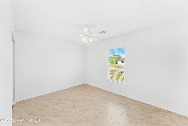 1591 Palatka Rd SE, Palm Bay, FL 32909 - empty room featuring baseboards, ceiling fan, and visible vents