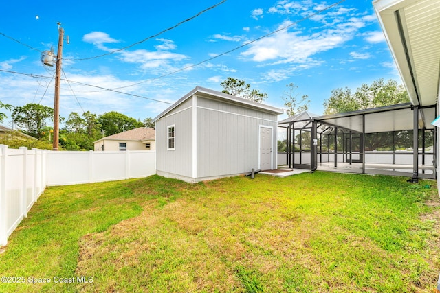 1591 Palatka Rd SE, Palm Bay, FL 32909 - view of yard featuring a lanai and a fenced backyard