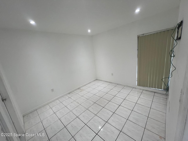 4841 NW 7th St Unit 203-4, Miami, FL 33126 - unfurnished room featuring recessed lighting and baseboards