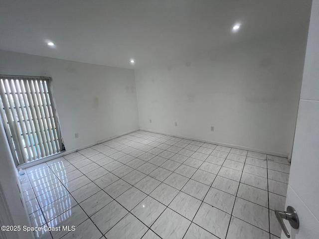 4841 NW 7th St Unit 203-4, Miami, FL 33126 - tiled empty room featuring baseboards and recessed lighting