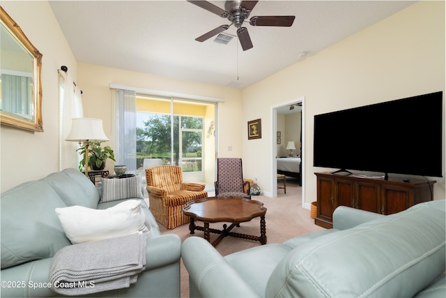 6008 Van Ness Dr, Melbourne, FL 32940 - living area with ceiling fan, light carpet, and baseboards