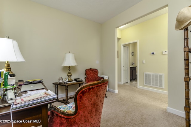 6008 Van Ness Dr, Melbourne, FL 32940 - home office featuring carpet flooring, baseboards, and visible vents