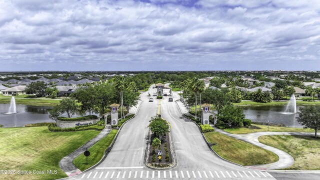 6008 Van Ness Dr, Melbourne, FL 32940 - bird's eye view featuring a water view and a residential view