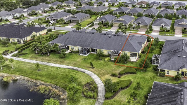 6008 Van Ness Dr, Melbourne, FL 32940 - aerial view featuring a water view and a residential view