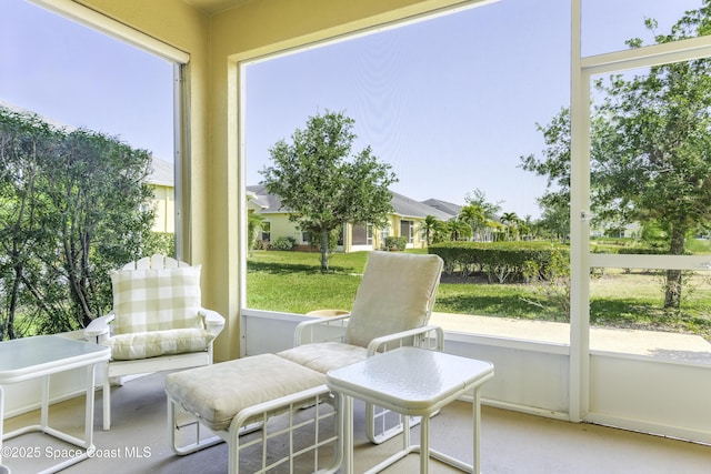 6008 Van Ness Dr, Melbourne, FL 32940 - sunroom featuring carpet