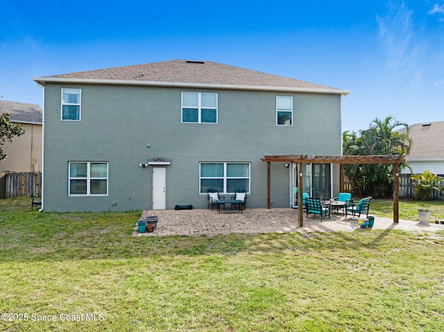 back of house with a pergola, stucco siding, and fence