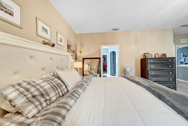 bedroom featuring visible vents and carpet flooring