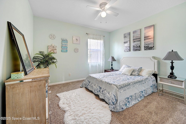 bedroom featuring baseboards, a ceiling fan, and carpet floors