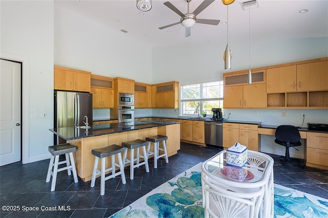 kitchen with high vaulted ceiling, open shelves, a ceiling fan, dark countertops, and appliances with stainless steel finishes