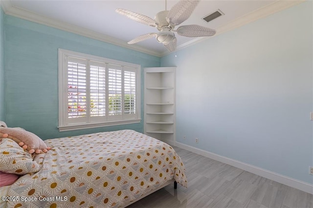 bedroom with visible vents, a ceiling fan, ornamental molding, and baseboards