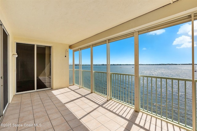 104 Riverside Dr Unit 402, Cocoa, FL 32922 - unfurnished sunroom with a water view