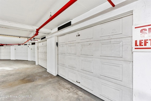 104 Riverside Dr Unit 402, Cocoa, FL 32922 - view of garage