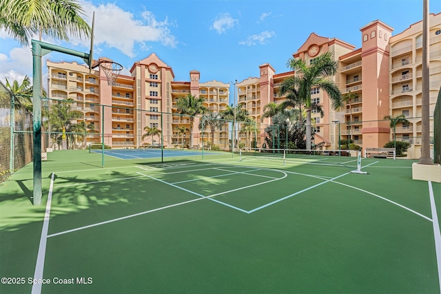 104 Riverside Dr Unit 402, Cocoa, FL 32922 - view of sport court with fence and community basketball court